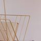 Vintage golden magazine rack
