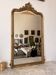 Large antique Louis XV style mirror in gilded wood.