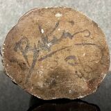 Free-form raku roller vase on heel, dated and signed