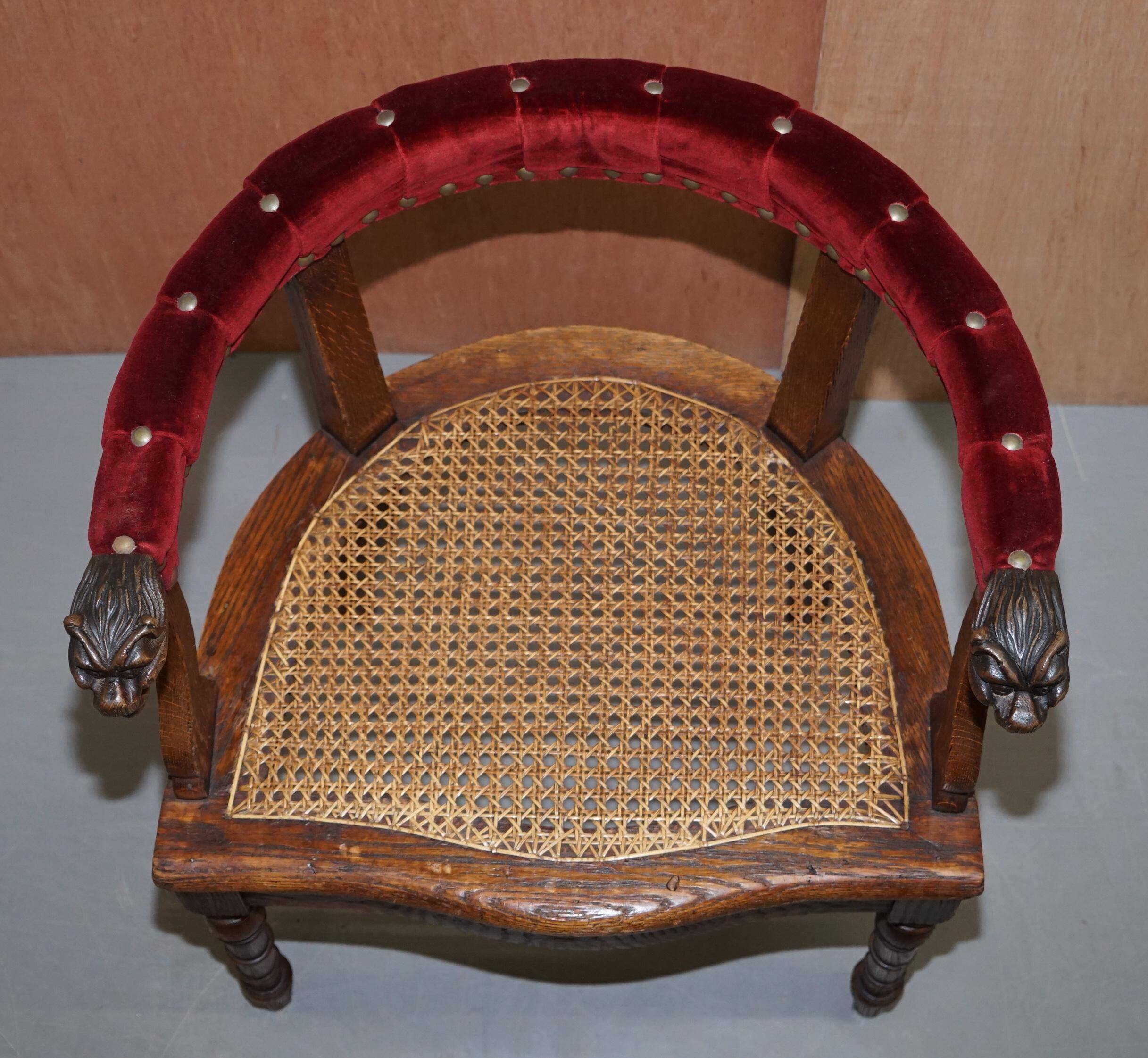 Antique Régence Bergère Armchair in Carved Oak with Lion Head Armrests