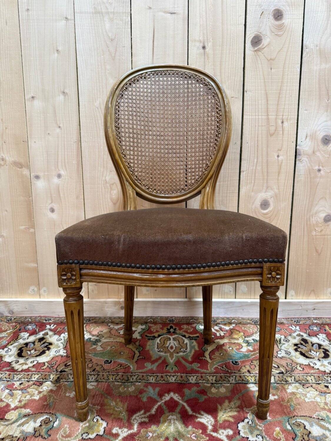 Set of 6 Louis XVI medallion chairs in wood and caning.
