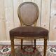 Set of 6 Louis XVI medallion chairs in wood and caning.