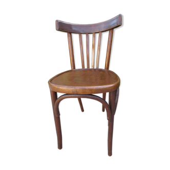 Old bistro chair in varnished wood
