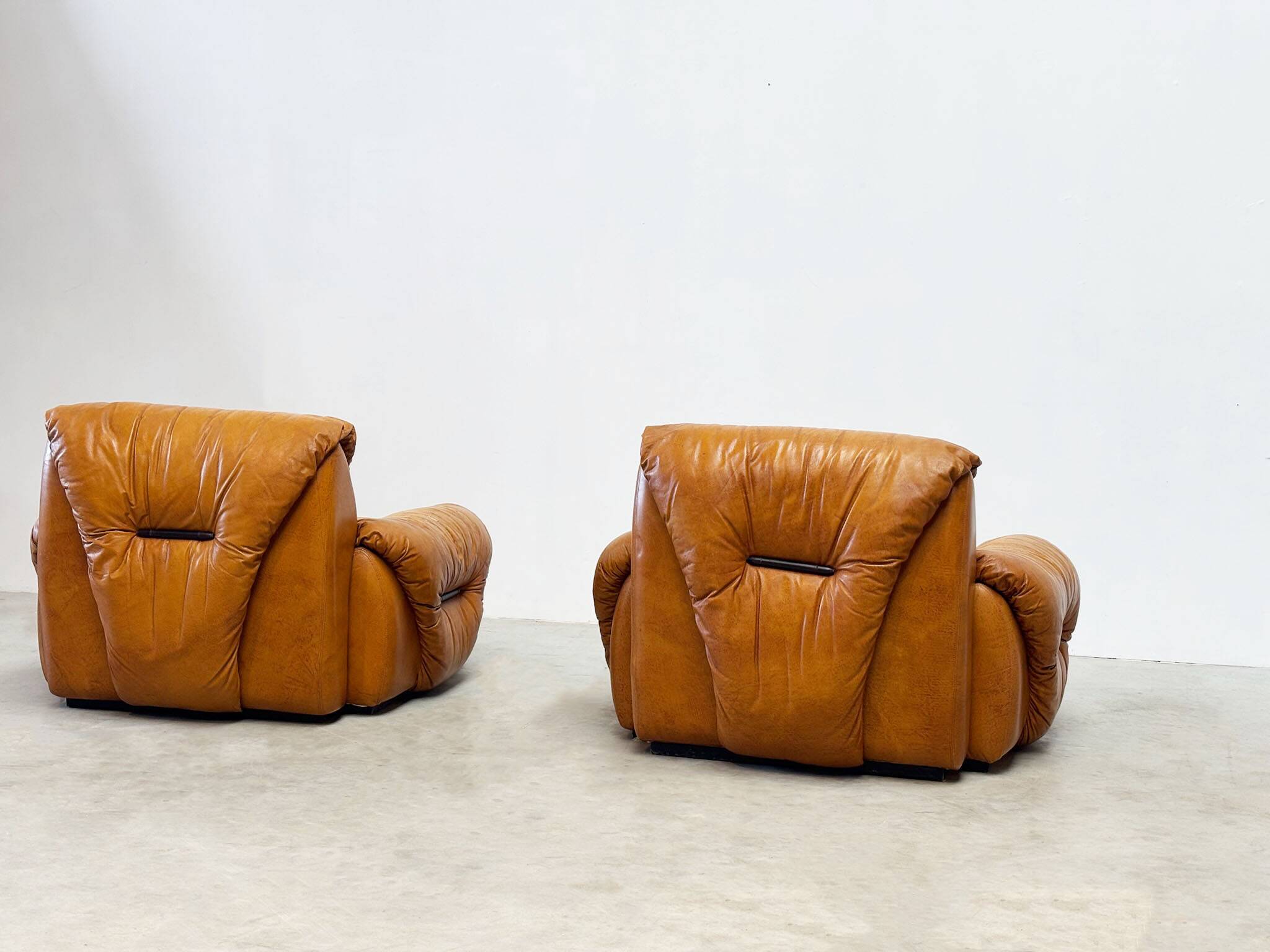 Set of two Italian cognac leather lounge chairs