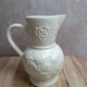 Vintage ivory earthenware jug – relief fruits