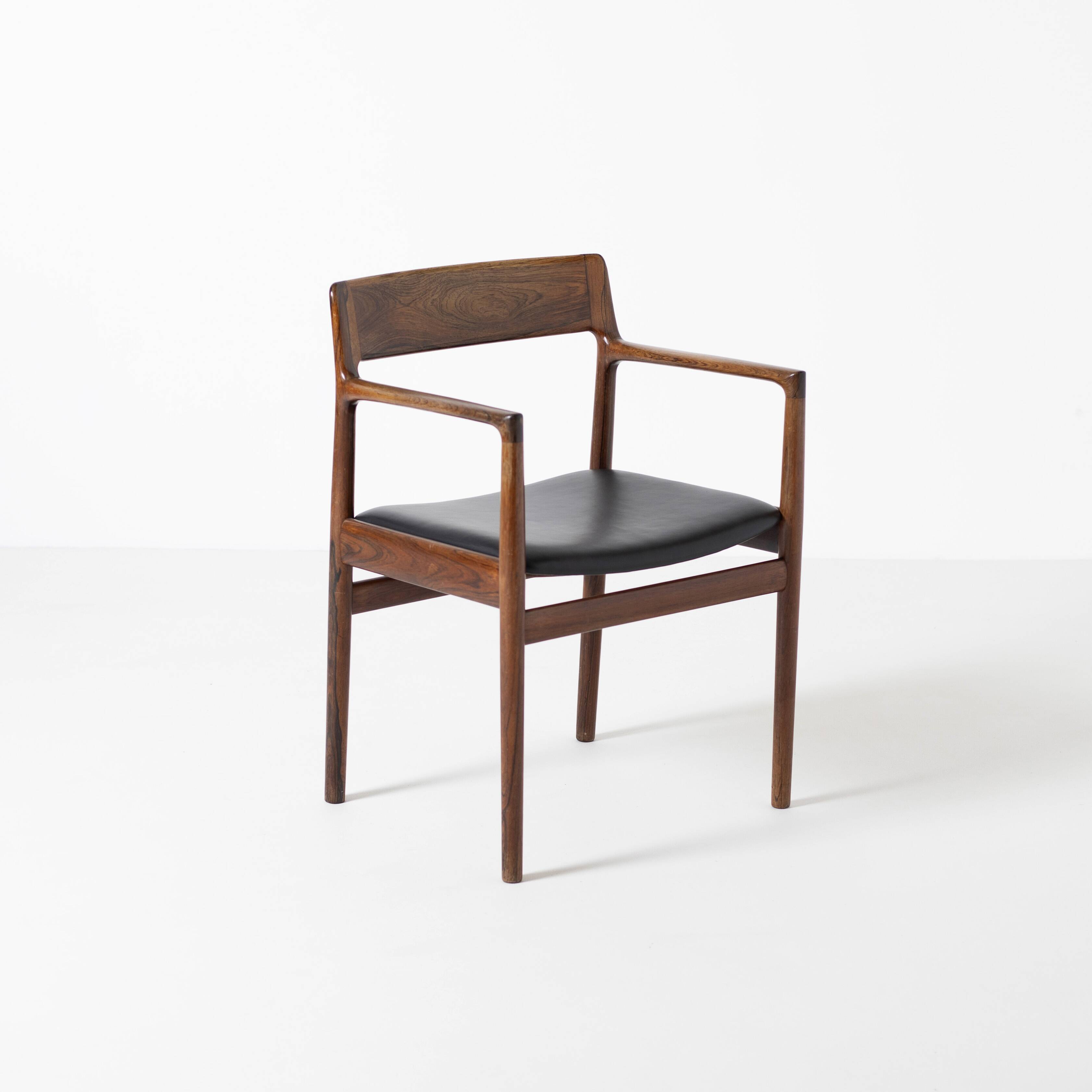 Armchair in rosewood and black leather, by J. Norgaard, Denmark, 1960s
