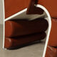 Pair of sculptural cognac leather armchairs, 1970s
