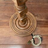 Brutalist floor lamp in turned wood, in the style of Charles Dudouyt.