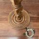 Brutalist floor lamp in turned wood, in the style of Charles Dudouyt.