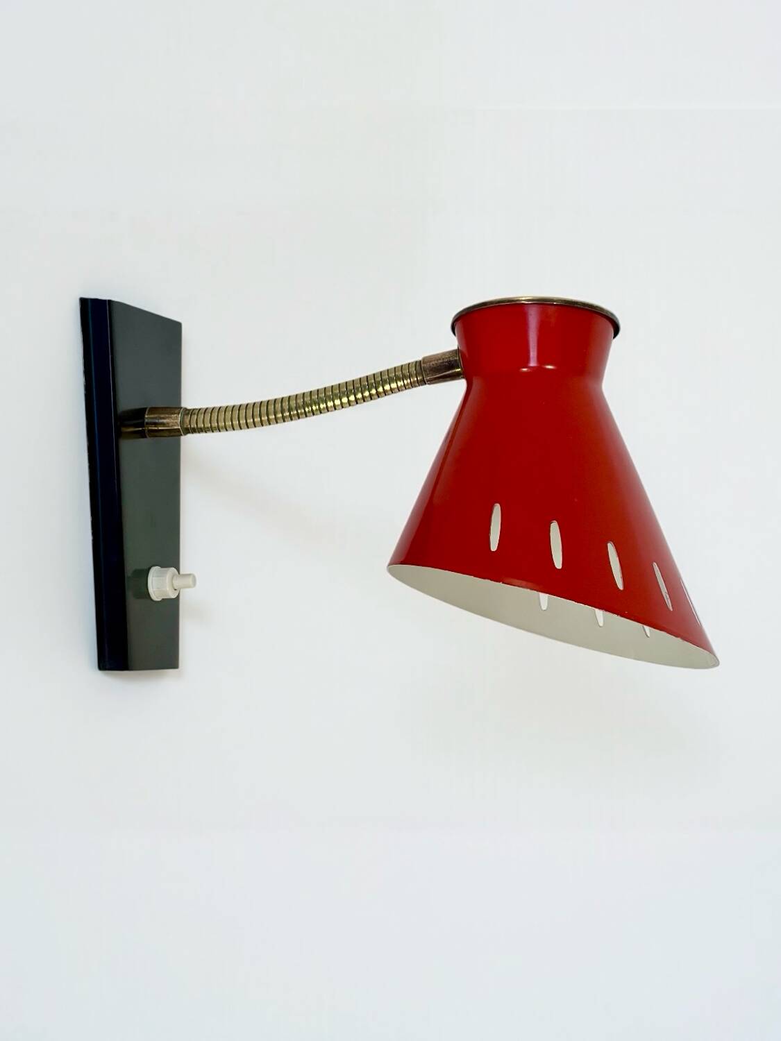 Vintage diabolo wall sconce in the style of René Mathieu