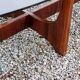 Designer coffee table by Hugues Poignant in rosewood and smoked glass from the 70s