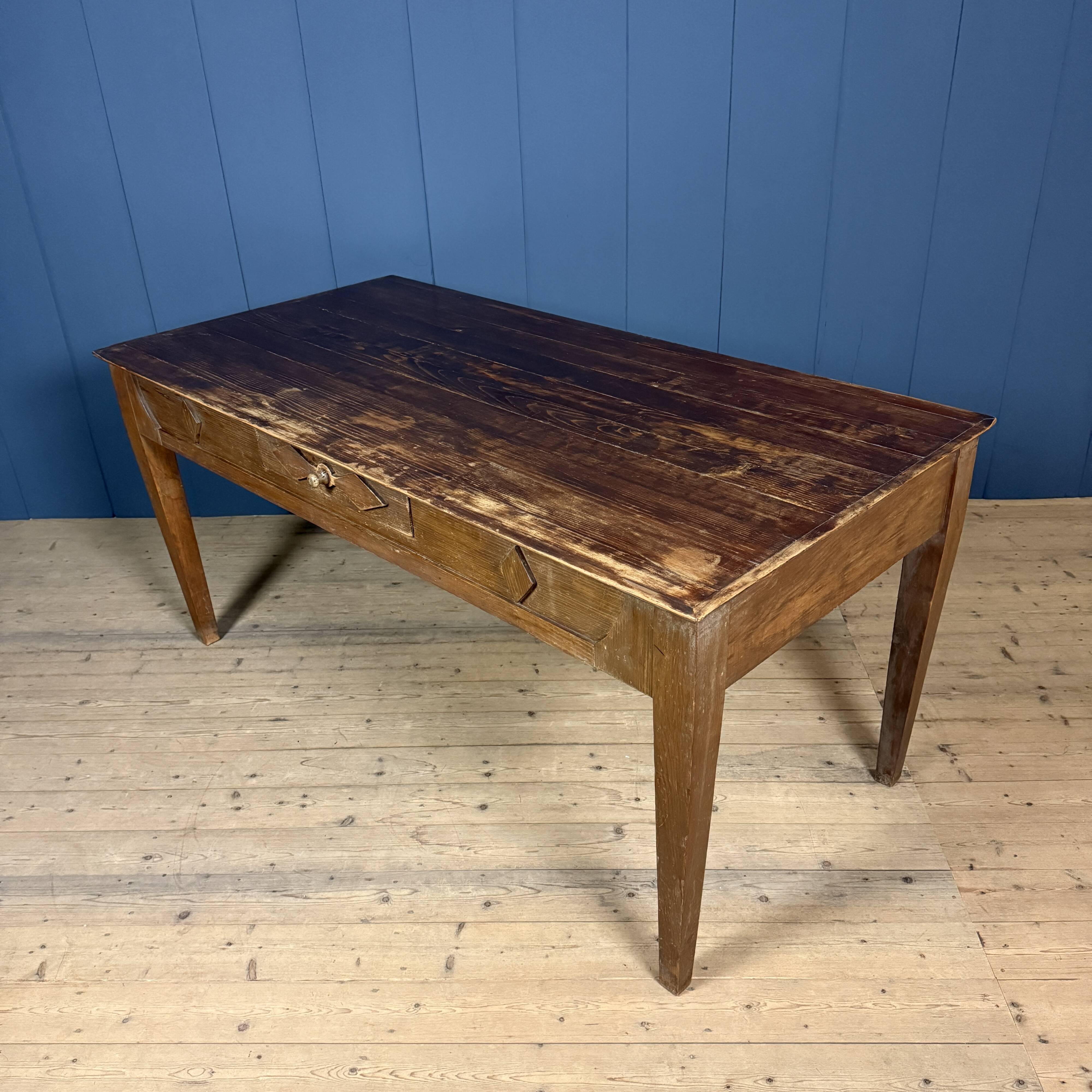 Old decorated wooden kitchen table