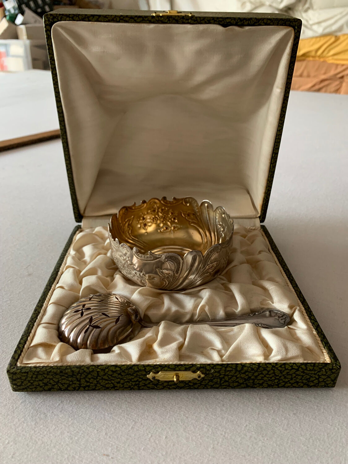 Old sauce pot and silver metal spoon