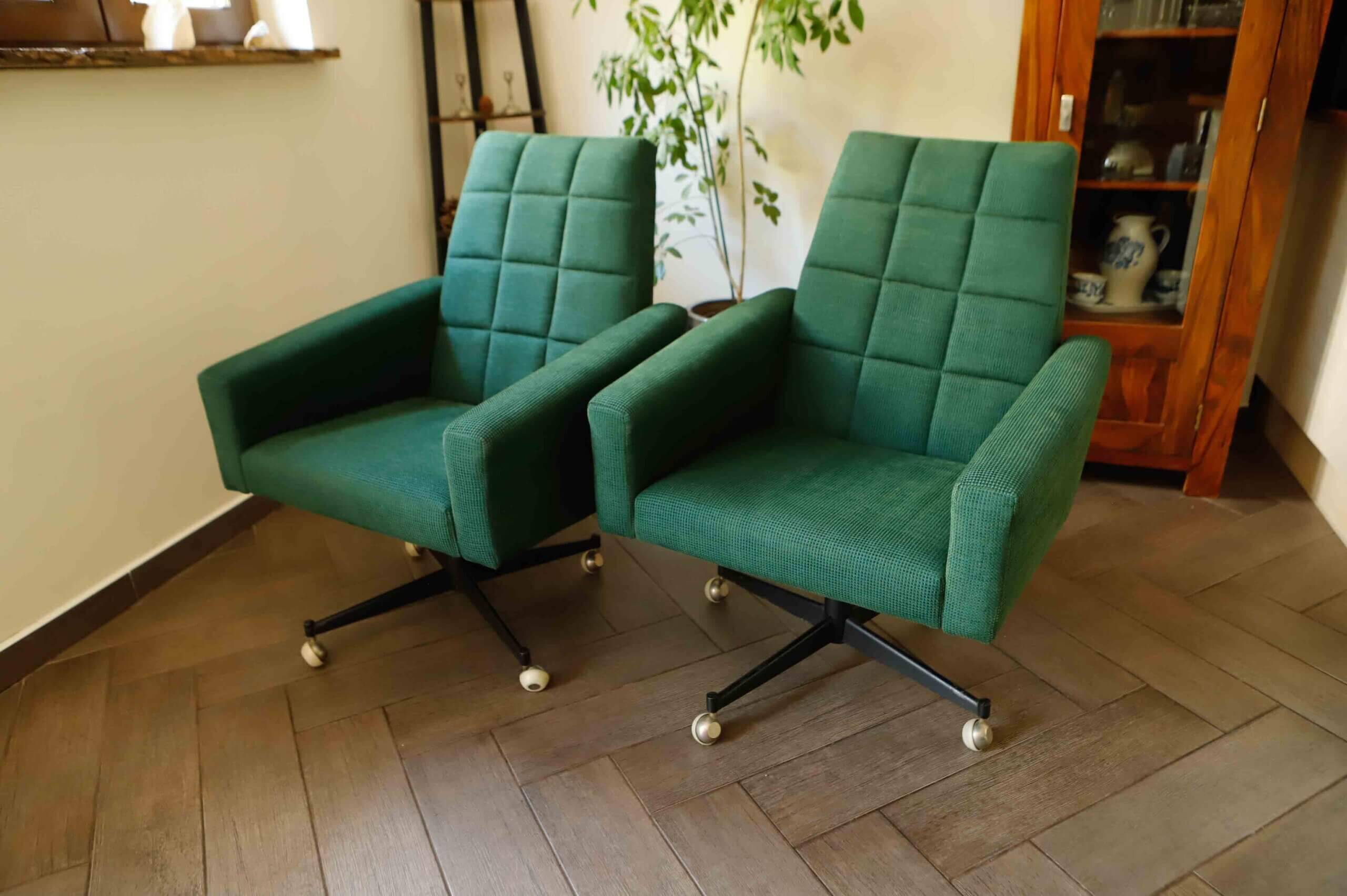 Pair of retro swivel chairs on casters