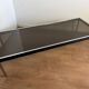 Grande table basse design années 70 chrome, verre fumé et skaï