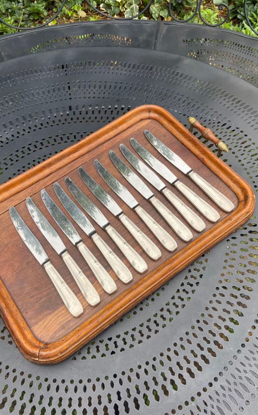 Set of 11 large silver metal knives