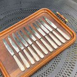 Set of 11 large silver metal knives