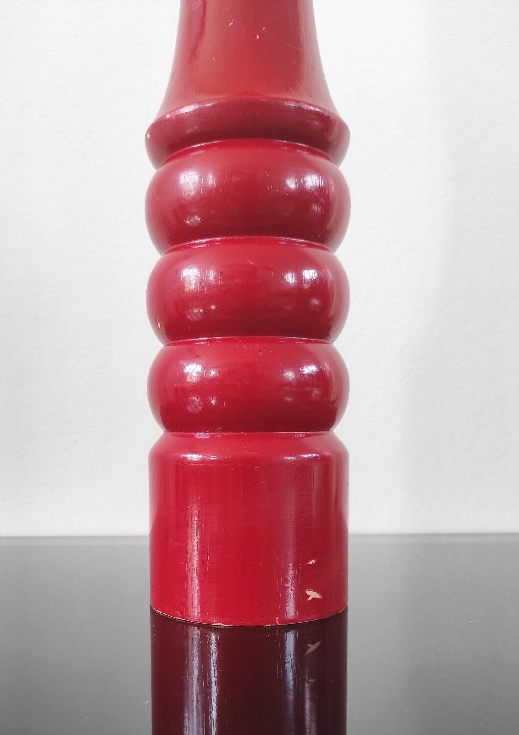 Giant vintage red lacquered wooden pepper mill