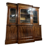 Projection bookcase in flamed mahogany from the 19th century
