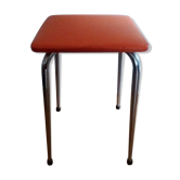 Tabouret orange pieds compas