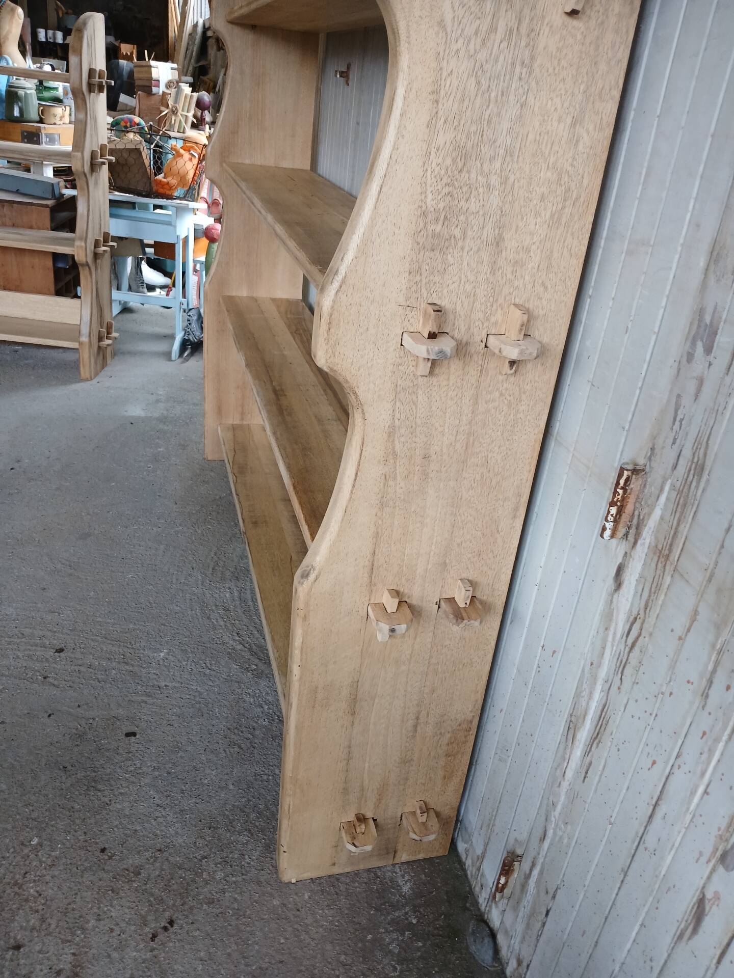 Solid wood shelf in brutalist style