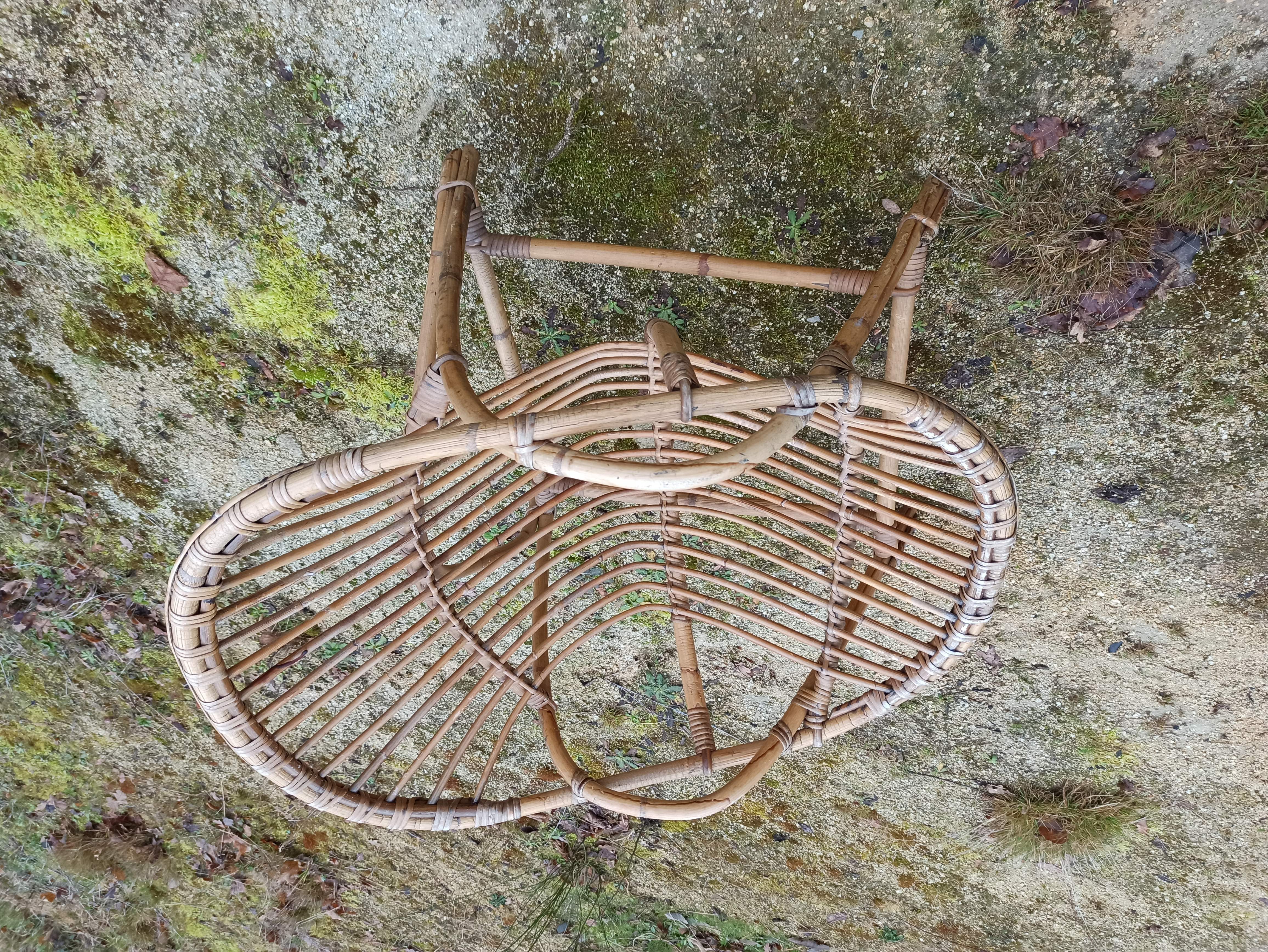 Rattan armchair with armrest