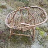 Rattan armchair with armrest
