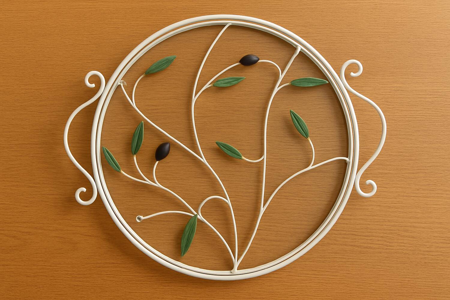 Round wrought iron and glass tray decorated with olives and foliage