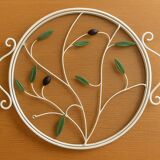 Round wrought iron and glass tray decorated with olives and foliage