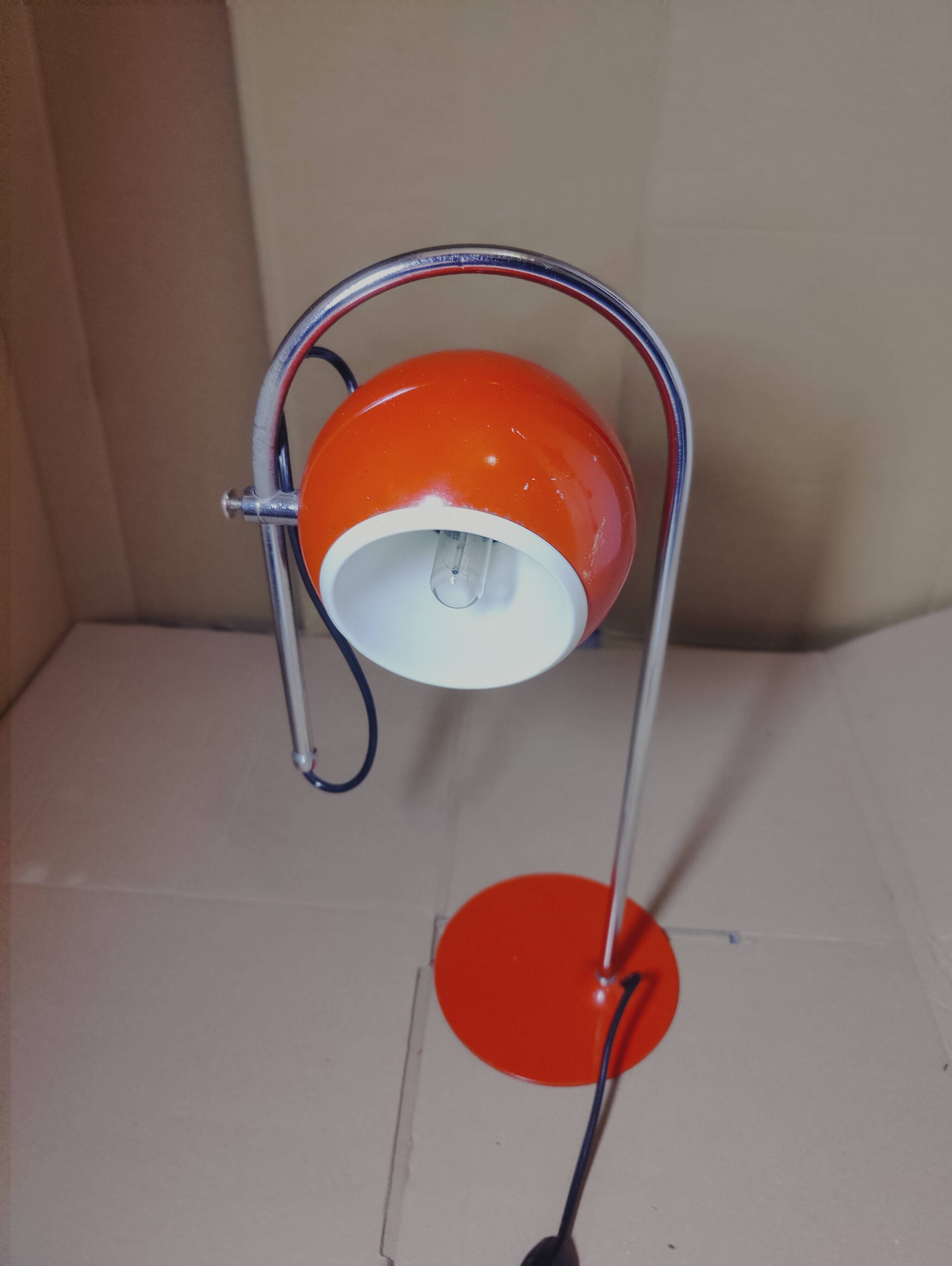 Eyeball space age orange desk or bedside lamp on an arc base
