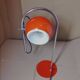 Eyeball space age orange desk or bedside lamp on an arc base