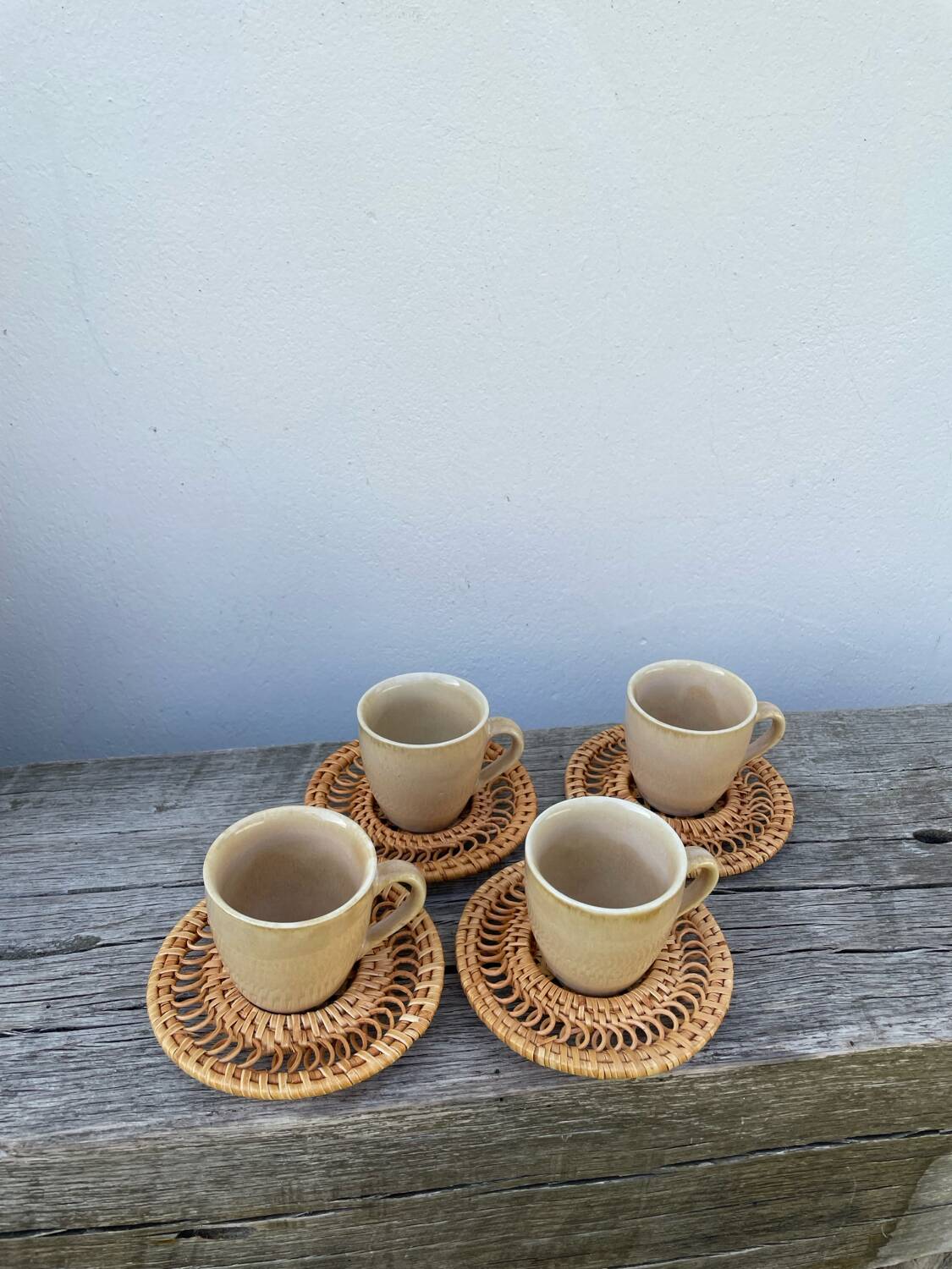 Ceramic and rattan coffee cups