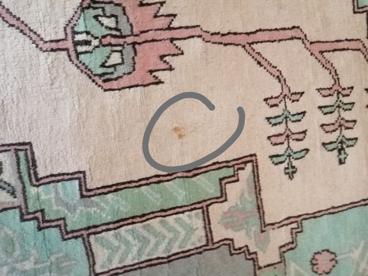 Afghan rug in pastel colors