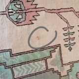 Afghan rug in pastel colors