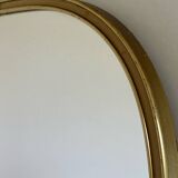 Vintage brass mirror in rear-view mirror shape