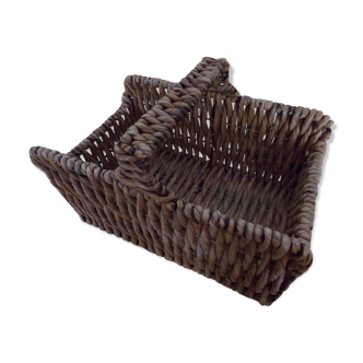 Rattan basket with logs