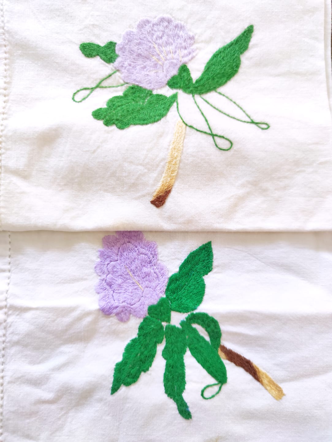 11 hand-embroidered antique table towels