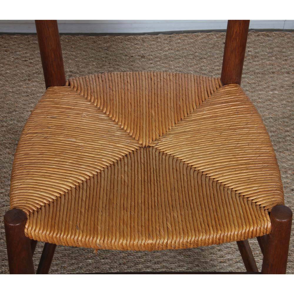 Set of 4 wooden chairs with rush seats, French work, 1950.