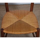 Set of 4 wooden chairs with rush seats, French work, 1950.