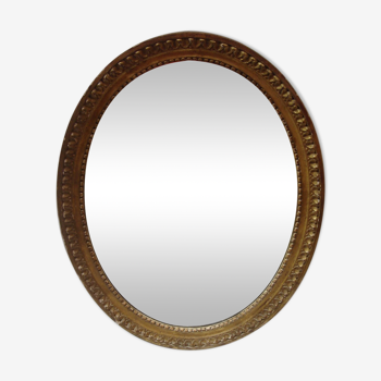 Miroir en bois doré ovale 36 x 47cm