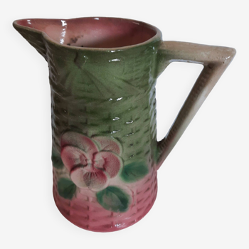 Slush pitcher. Pansy pattern on wicker basket background. Green and pink.