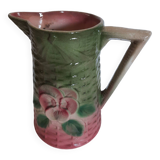 Slush pitcher. Pansy pattern on wicker basket background. Green and pink.