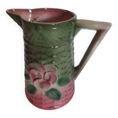 Slush pitcher. Pansy pattern on wicker basket background. Green and pink.