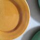 Flat plates in enamelled terracotta