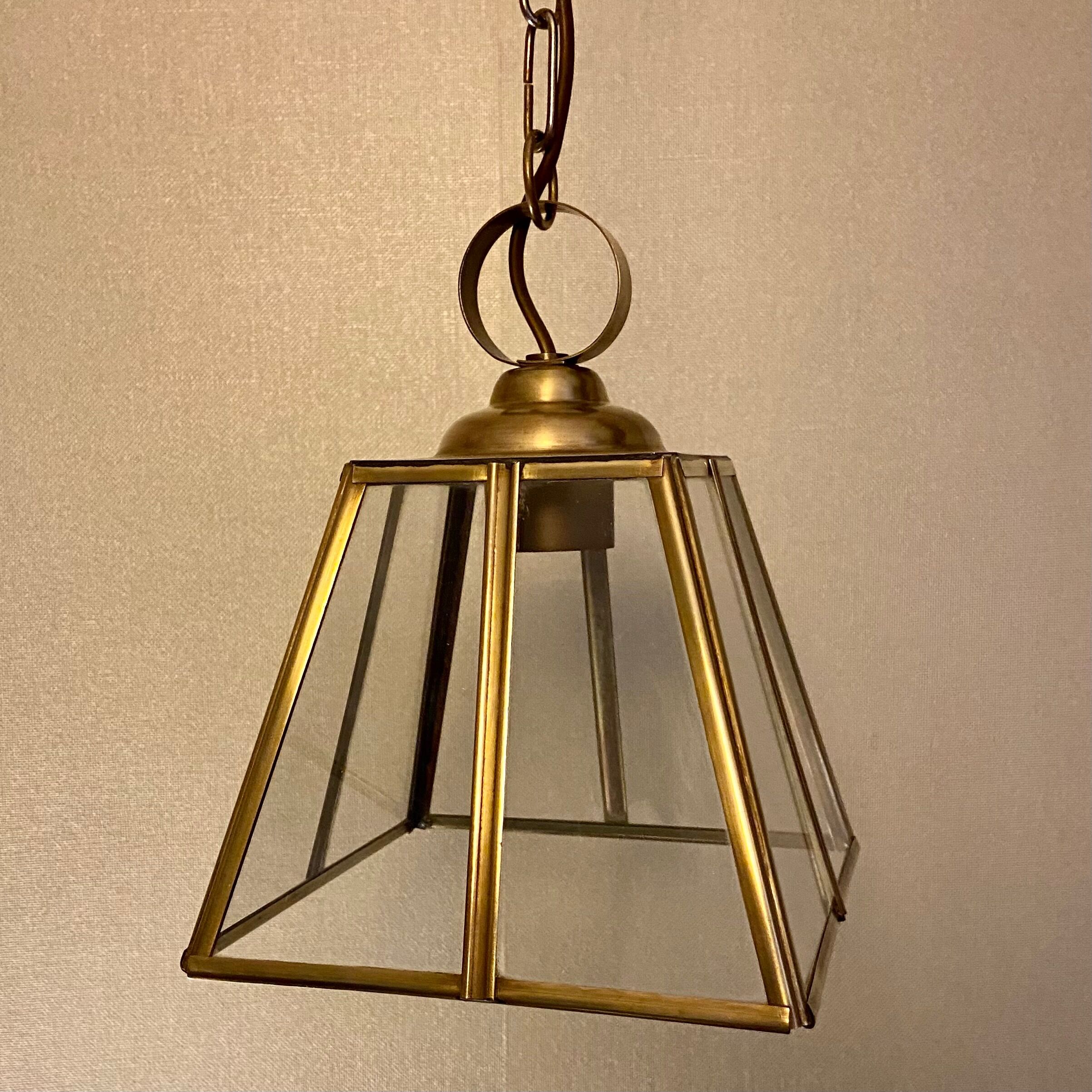 Glass and brass suspension