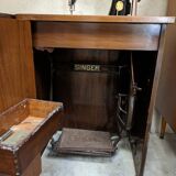 Singer sewing machine in its cabinet