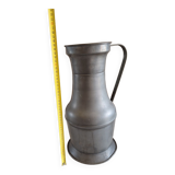 Large copper pitcher and old tin