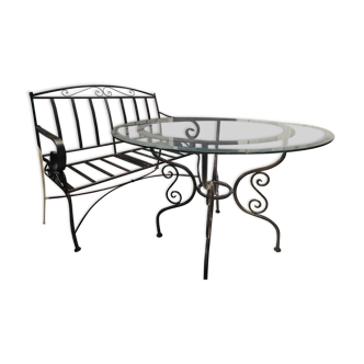 Table in wrought iron and glass, and matching two-seater bench