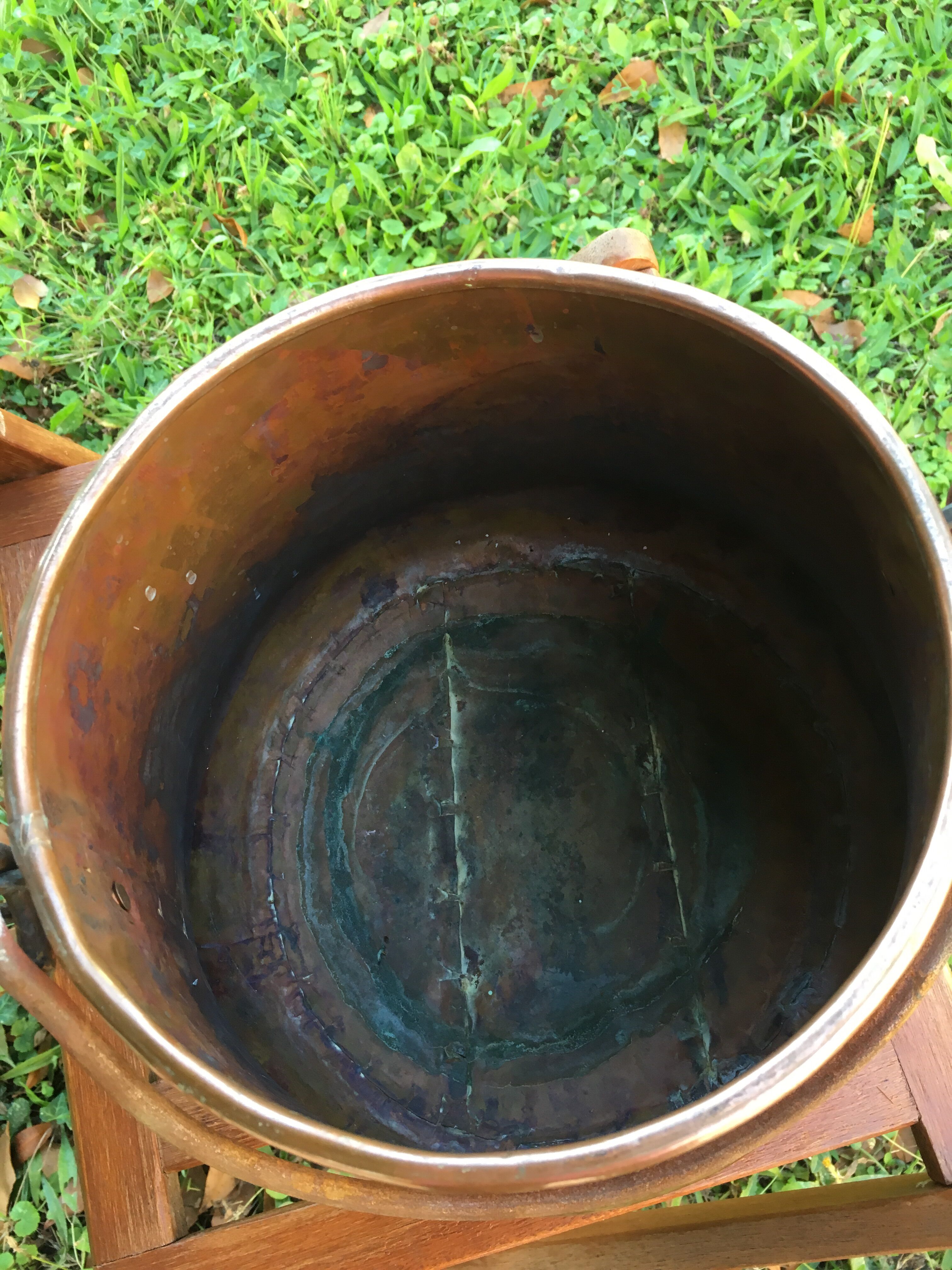 Old copper pot cover