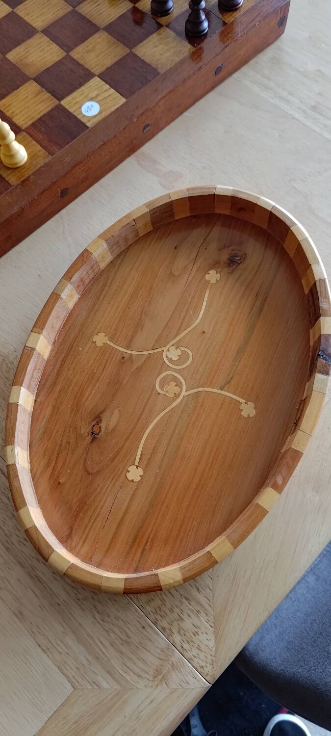 Inlaid wood top.
